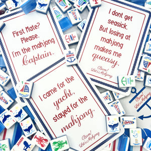 Mahjong tiles and cards with humorous text on a white background