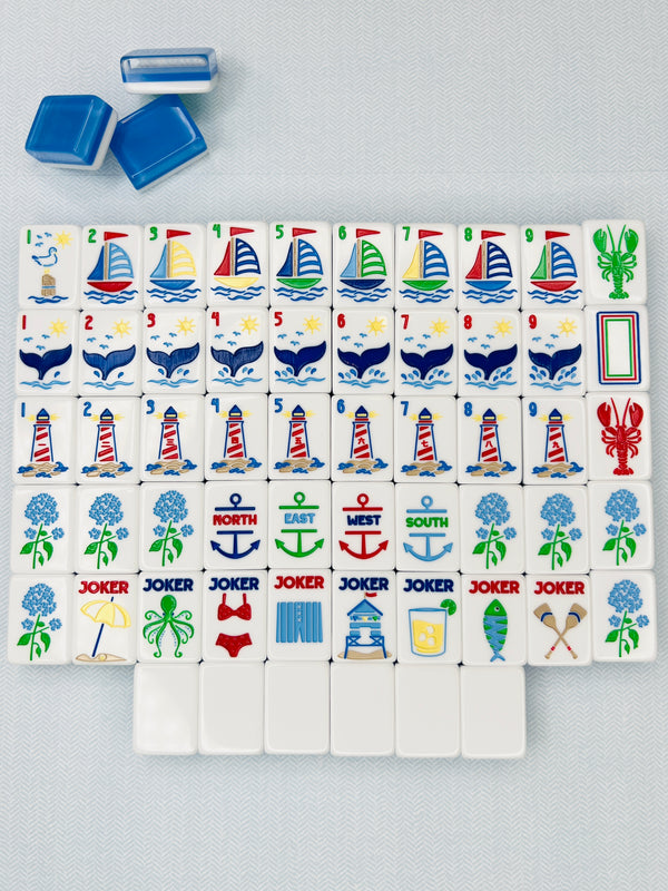 Set of dominoes with various designs on a light gray background
