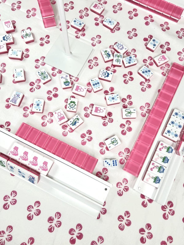Mended Pink Tablecloth Displayed with White racks and Pink Tiles