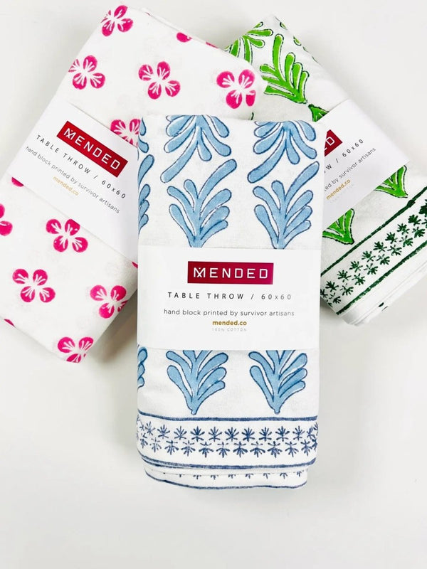 Packaged Mended Tablecloths in Green, Blue, and Pink
